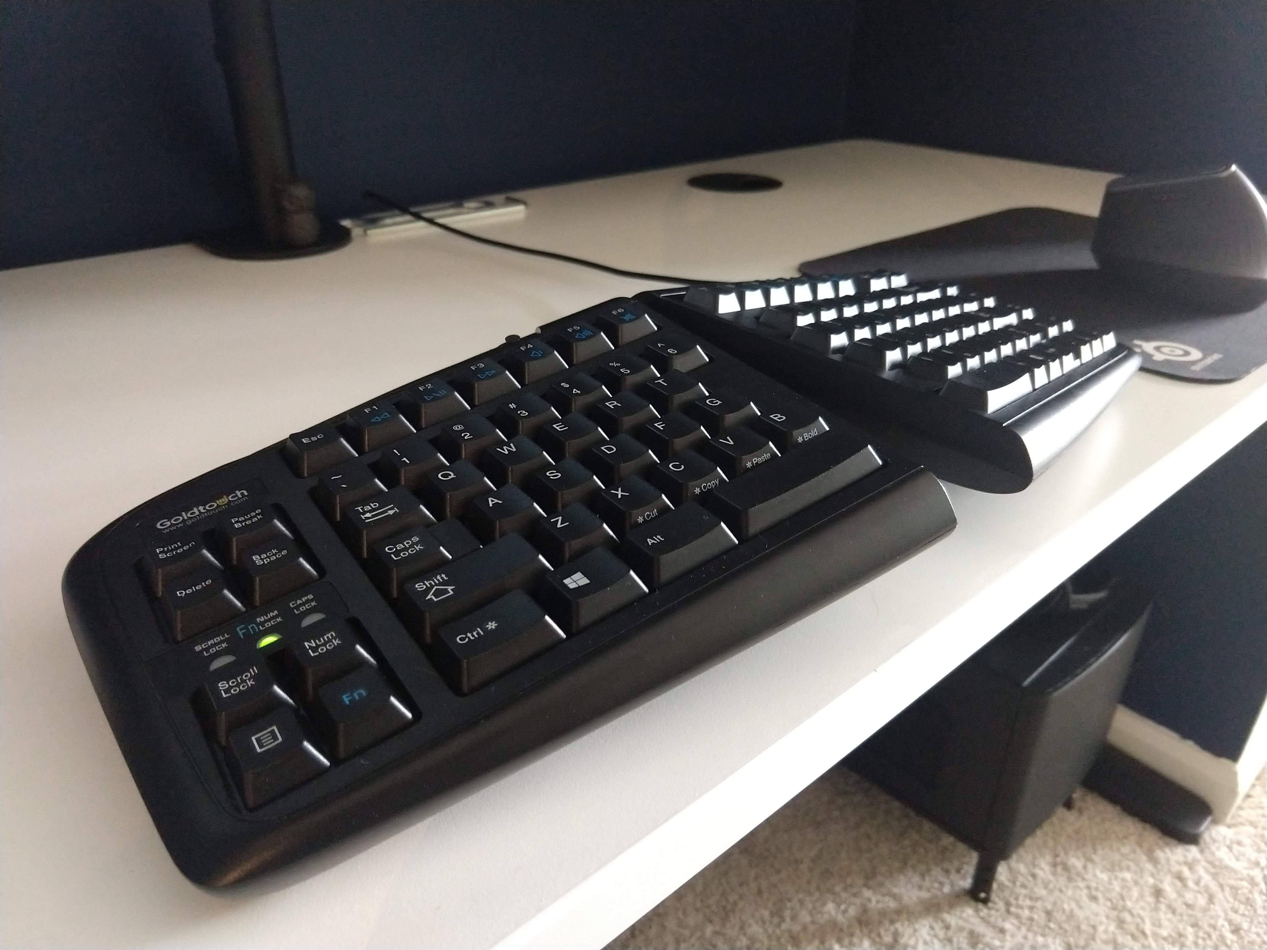 Photo of a black tented keyboard.